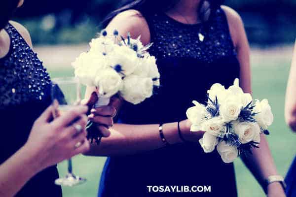 bridesmaid bouquets of white flowers champagne