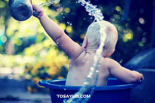 baby splashing water