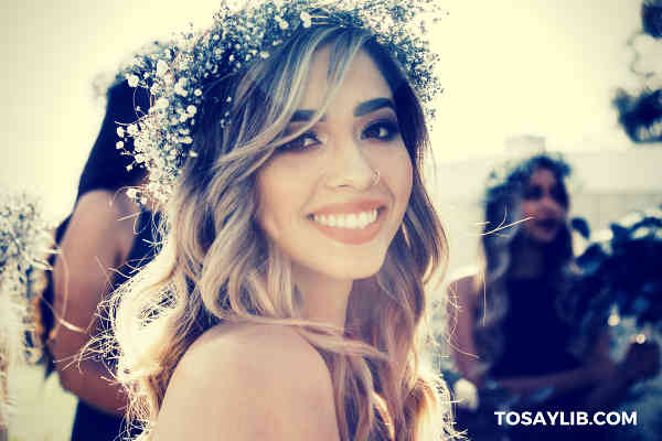 bridesmaid looking at camera smiling