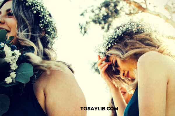 bridesmaid touching her head thinking