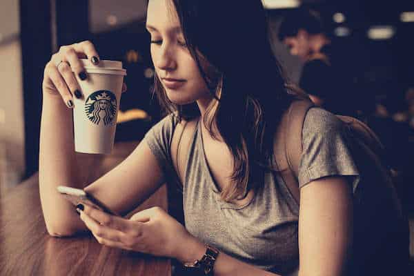 girl-holding-coffee-breakup-text-cafe