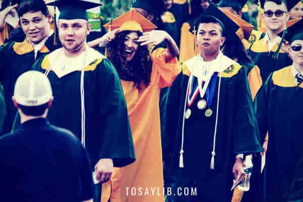 graduation ceremony students laughing