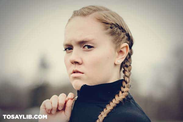 10 Photo of a woman wearing black jacket looking pissed