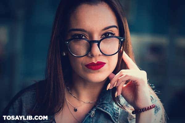 13 Portrait of a seriou woman wearing eyeglasses