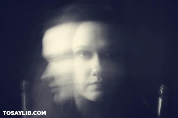 19 Black and white photo of a lady with blurry face