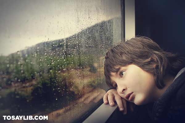 25 Picture of a lonely boy staring out the window