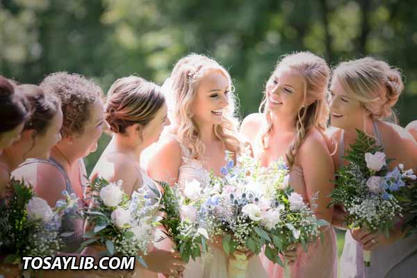 12 Photo of a bride with her friends happily smiling