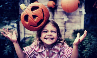 03-feature-orange-pumpkin-on-girl-s-head-halloween