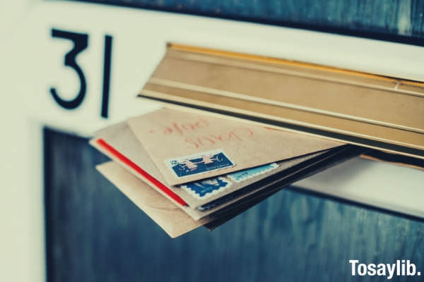 brown envelopes in mail box