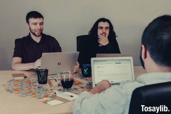 3 men working using their laptop coffee