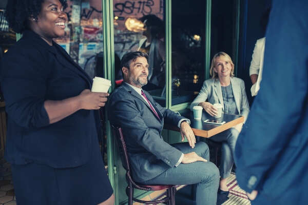 people having a coffee break officemates