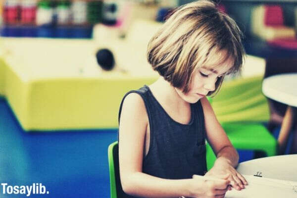 cute little girl writting 1