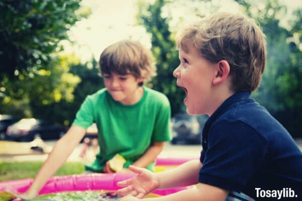 two boys playing happy