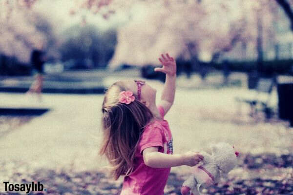 07 endP cherry blossom little girl holding doll pink clothes