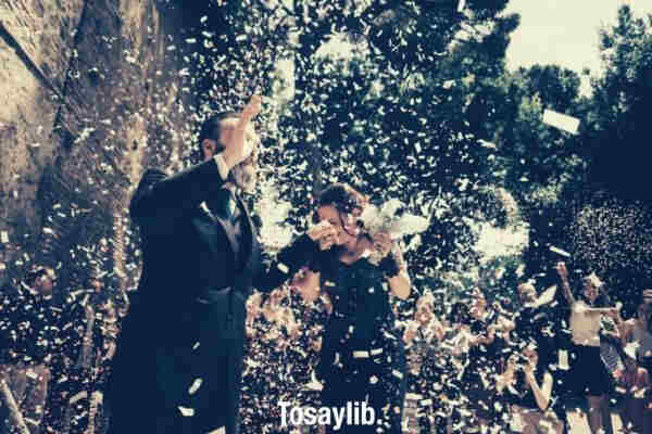 wedding happy ceremony for a couple confetti