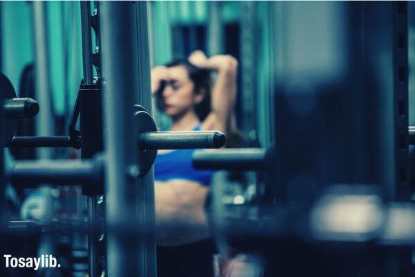 gym equipment blur woman background