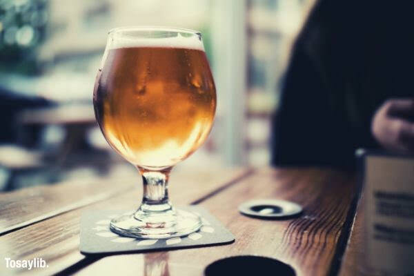 glass of beer on table