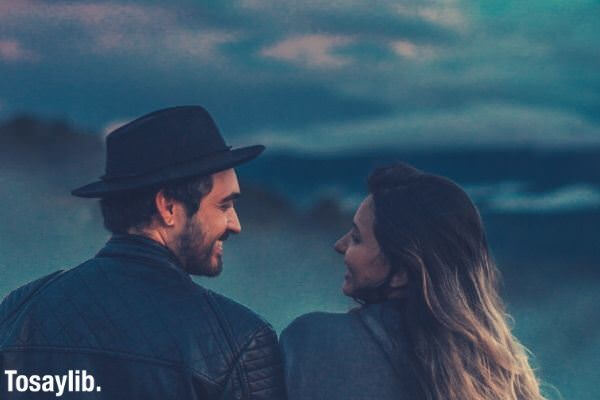 couple staring each other during golden hour