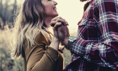 couple-holding-hands-happy