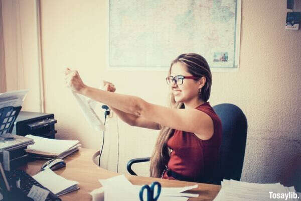 paper office paperwork woman strong glasses work