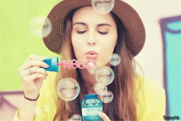 bubble blowing girl