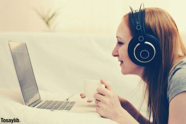 girl listening on headphones