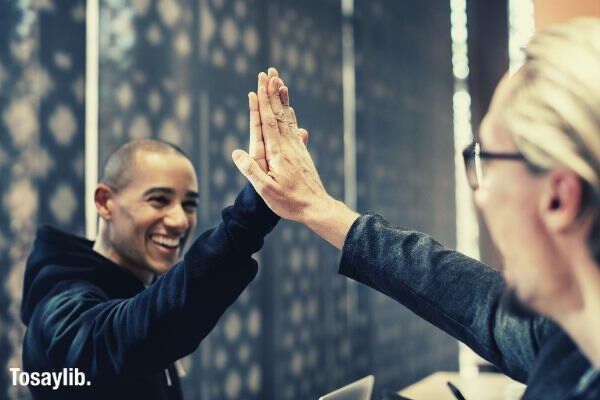 achievement agreement colleagues high five