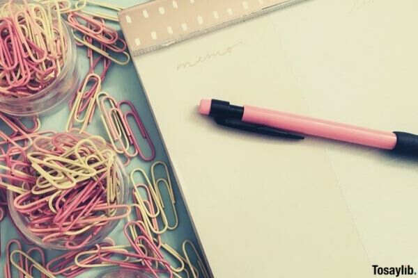 pink pink yellow abstract office planning pastel desk desk overhead top view paperclips flatlay