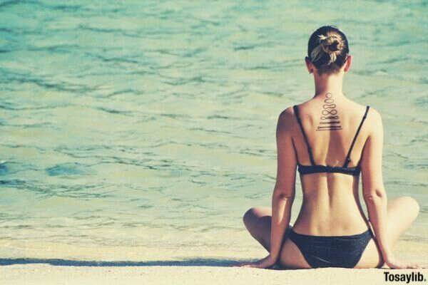 girl yoga beach side