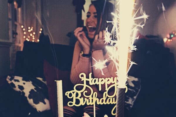 feature-Birthday-girl-cake-happy-woman