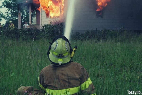 fireman water hose fire