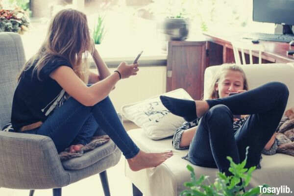 friendship teenage girls mobile phone phone best friend cellphone interiors at home two girls