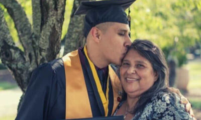 man-graduate-kiss-mommy-smiling
