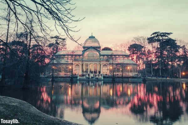 body of water across white mansion