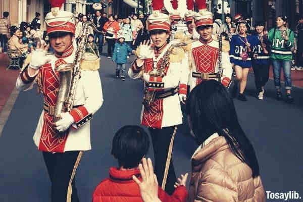 disneyland band waving hands