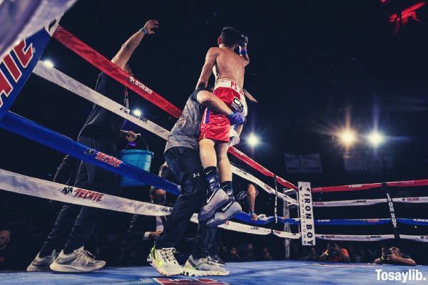 man in red jersey short boxing