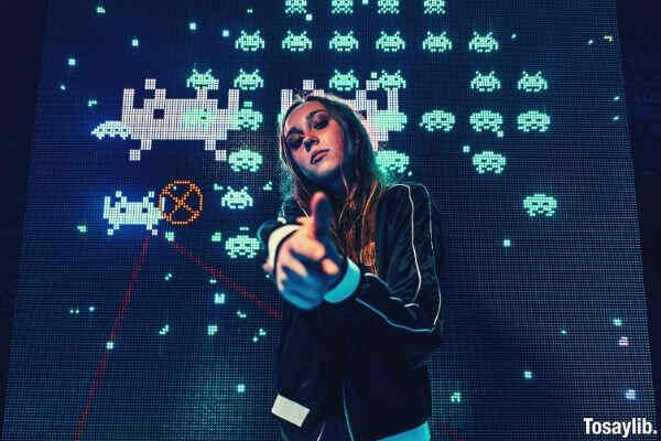 woman wearing black jacket pixel game background