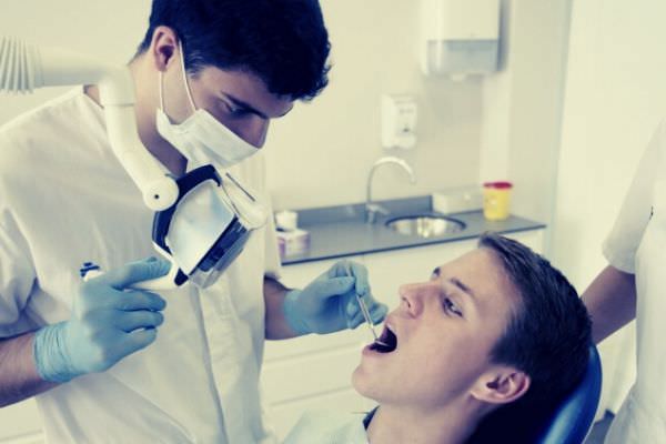 dental treatment boy client boy dentist