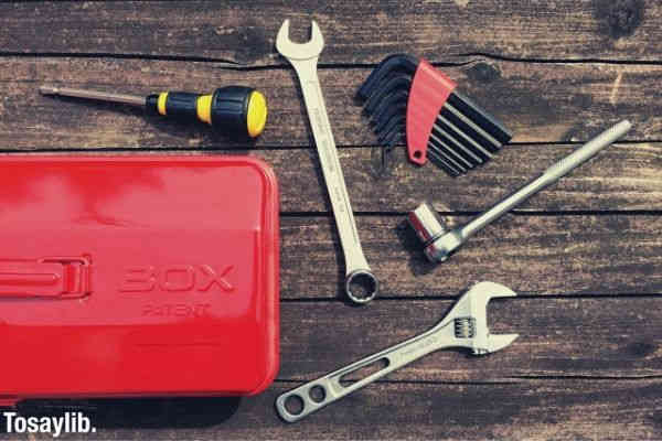 red tool box and various tools