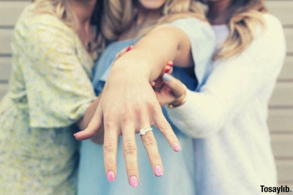 two women holding a woman s hand in the middle