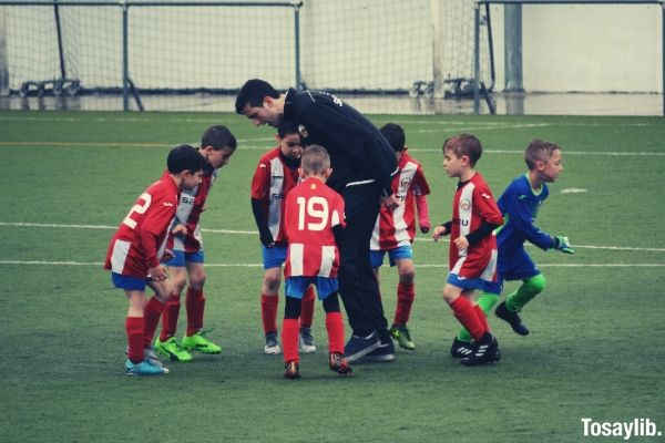 children playing soccer photo