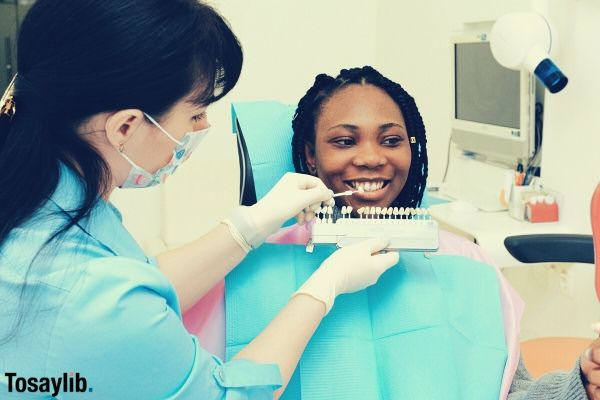 woman in blue dentist woman smiling