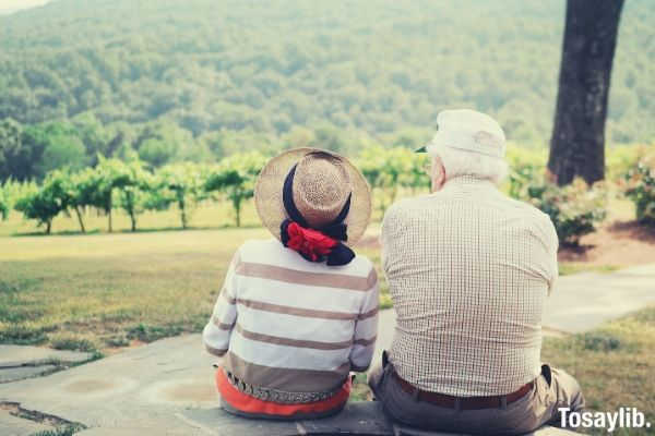 couple sitting on the pathway