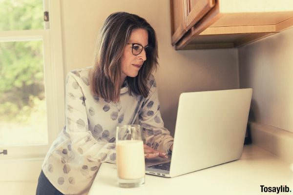 10 woman using her macbook pro