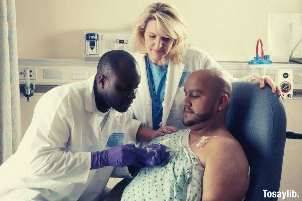 Black american injecting on a patient