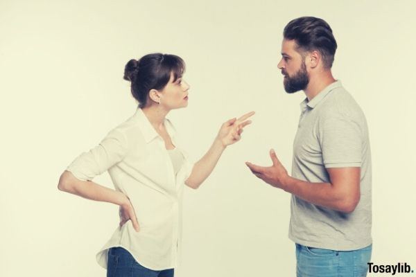 06 woman in white saying something to a guy