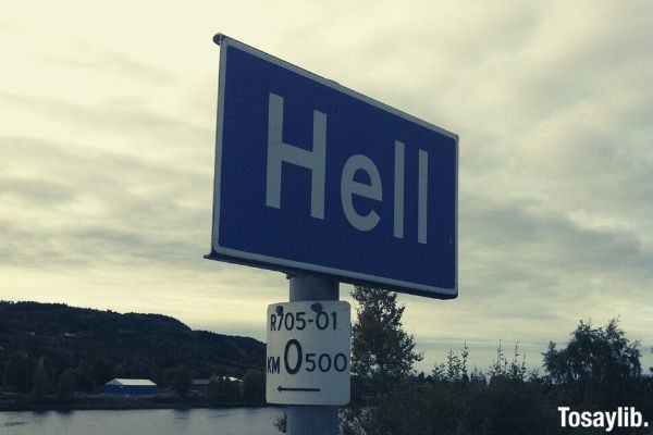 photo of signage hell blue post sign