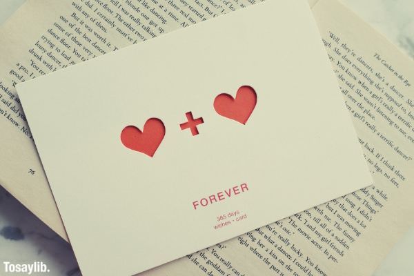 white paper postcard with heart plus heart forever