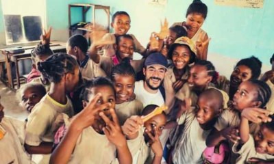 Photo-of-children-smiling-with-the-teacher