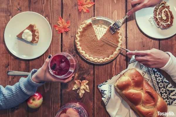 thanksgiving food pie people eating table bread